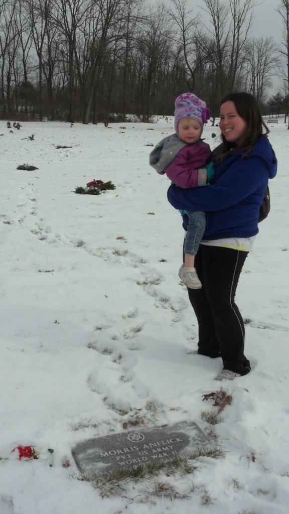 My sister and niece at Grandpop's grave, January 2014.